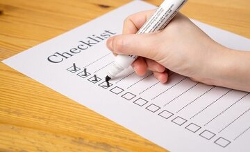 Image showing a paper checklist with 4 ticks